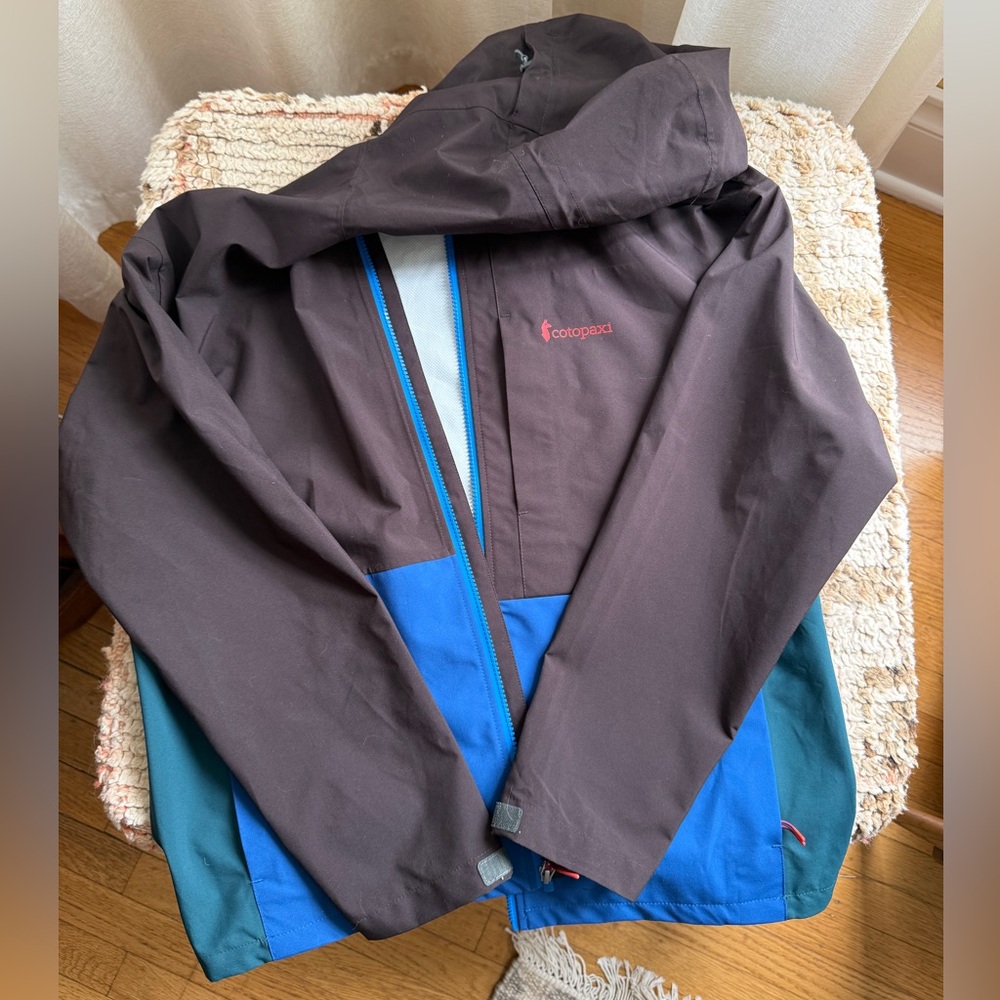 Cotopaxi Black, Green and Blue Color-Block Raincoat with Water-Resistant Fabric